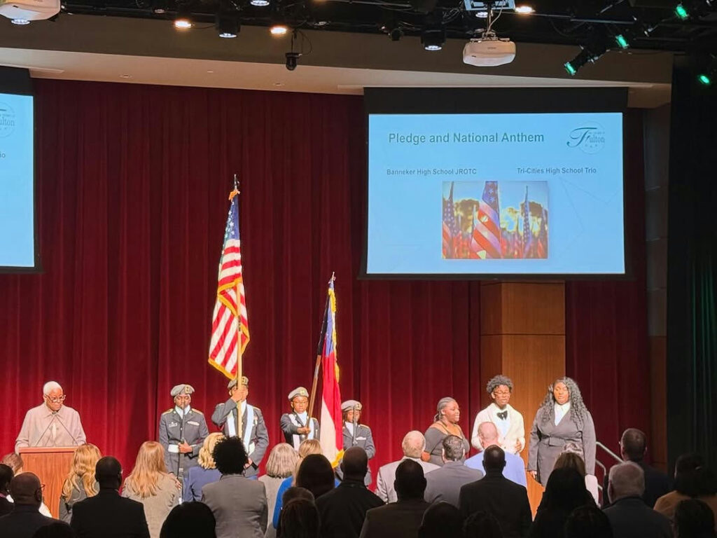 Photo shared by Fulton County Schools on October 27, 2025 tagging @tchsmagnetchorus, @bannekerjrotc, and @bhs_trojans. May be an image of ‎text that says '‎ک Pledge PledgeandNationalAnthem and National Anthem Banneker High BannekerHighSchociJROTC School SchoolJROTC Fralton Tri-CitesMighSchoolTra ท Trl-CitiesHighS School‎'‎.
