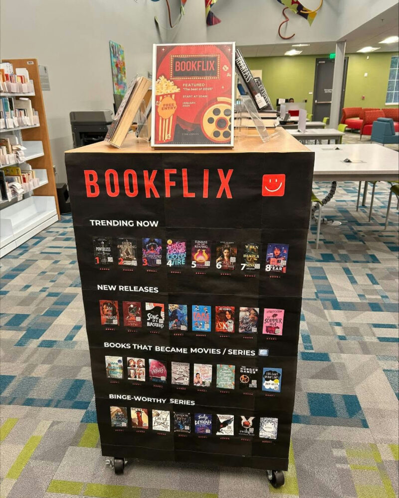 Photo by Fulton County Library System on January 19, 2026. May be an image of rack, poster, screen, book, shelf and text.